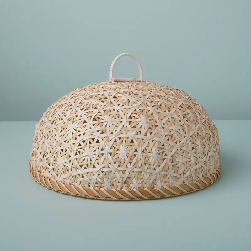 Beautifully handcrafted cloche made from seagrass, rattan and bamboo pieces in natural and white mixture.  11.75" x 5.75"