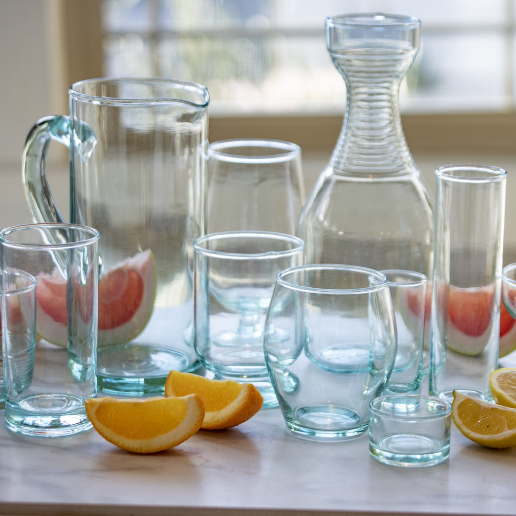 Recycled glass pitcher by BeHome with other bar collection items such as wine glass, drinking glass, champaign glass, decanter