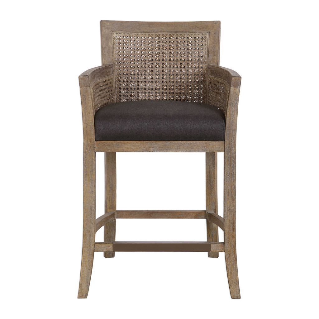 Encore counter stool by Uttermost, natural color with dark gray fabric.