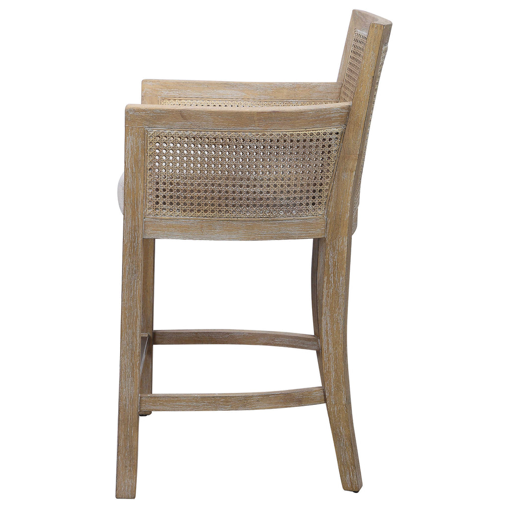 Encore counter stool by Uttermost, natural color with off-white fabric side view.