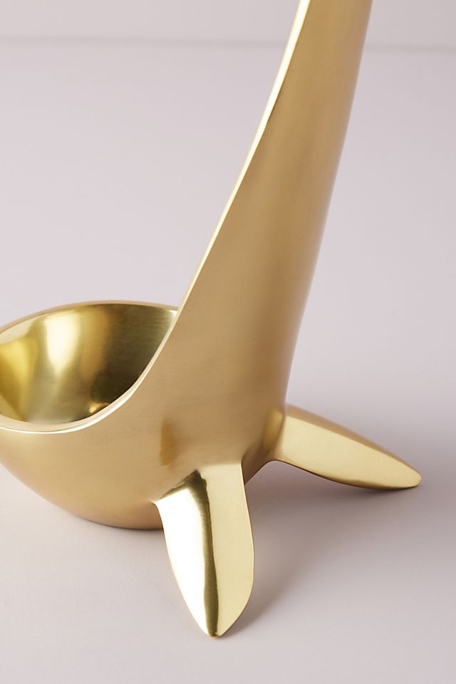 Gold Polished aluminum whale bottle holder by BeHome front view.  Edit alt text