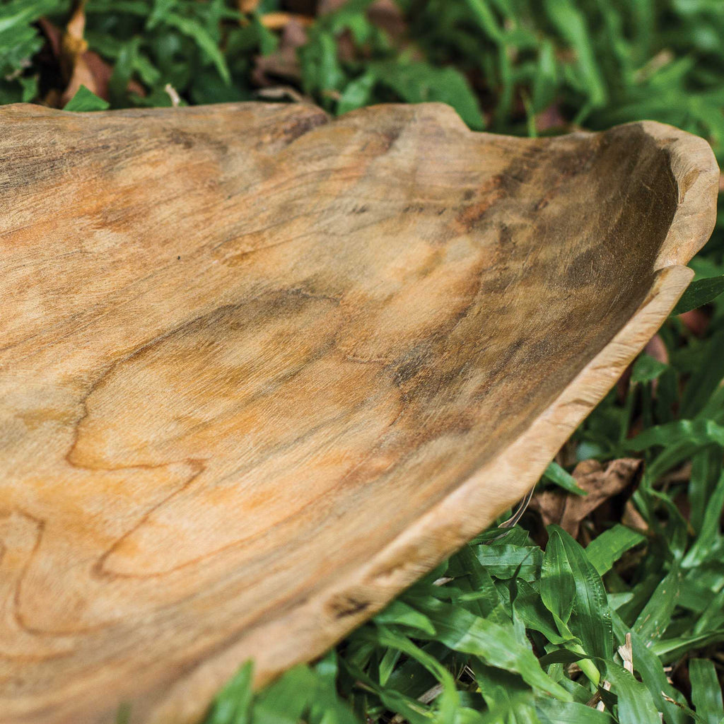 Up close view of teak leaf bowl by Uttermost