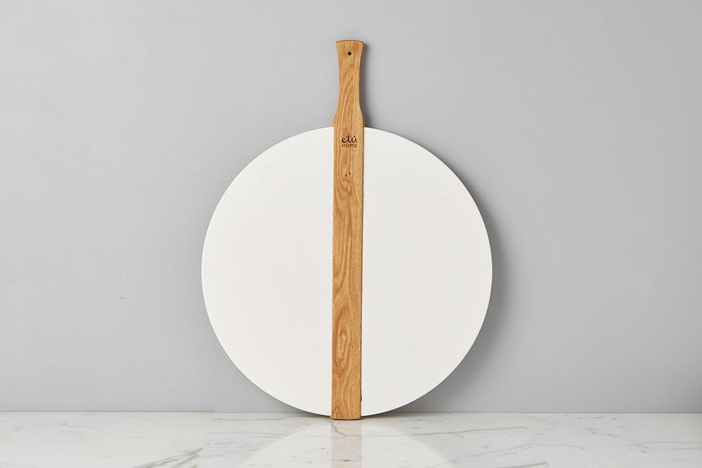 Large White Round Italia Charcuterie Board. Hand-crafted from reclaimed wood, this charcuterie board can also double as a decorative kitchen accent. 